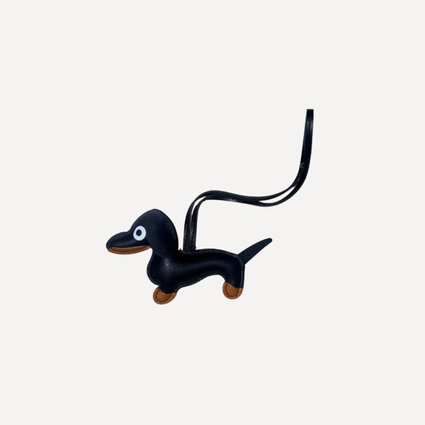 Black puppy charm